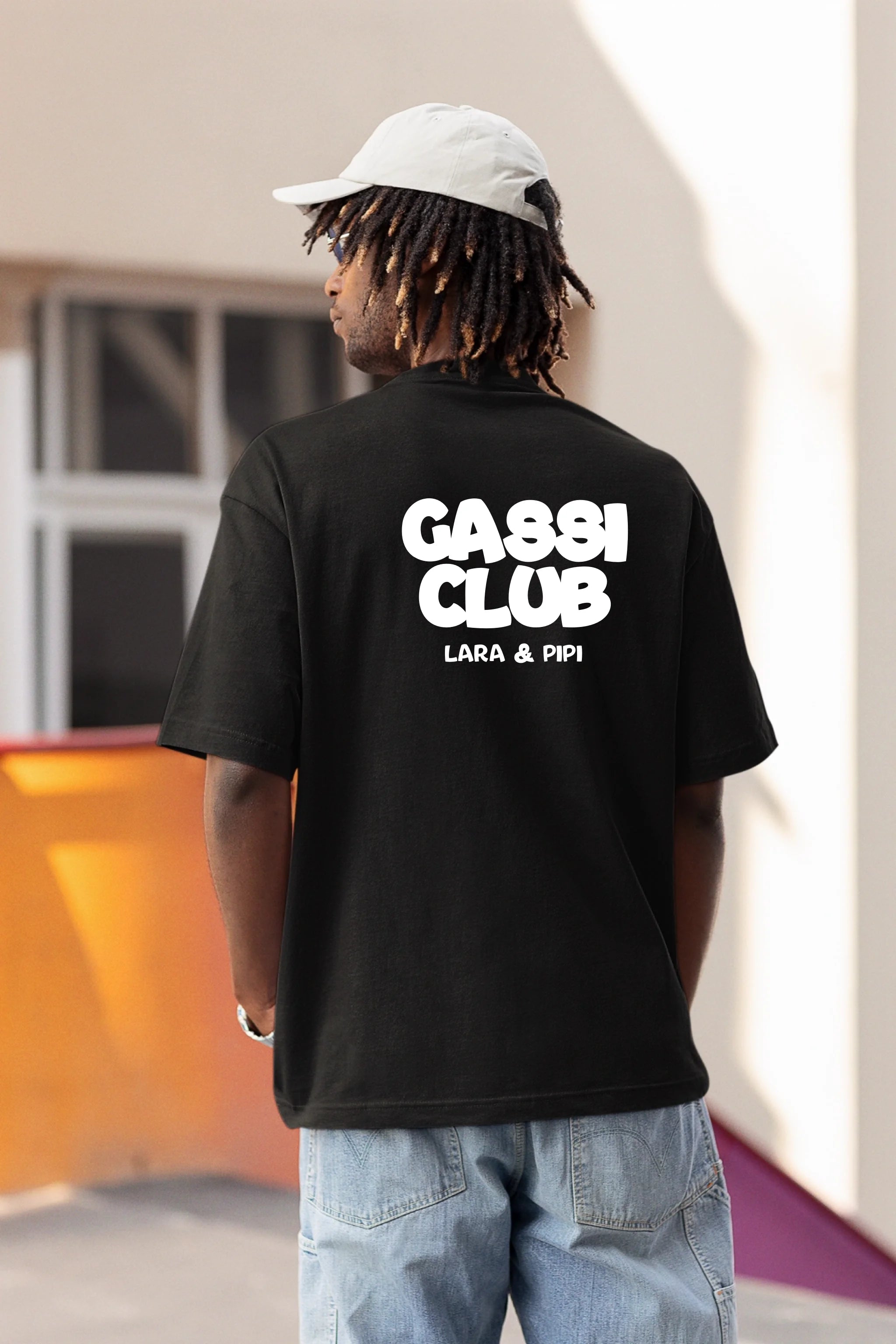 back-view-mockup-of-a-man-wearing-an-oversized-t-shirt-m25216 (1)